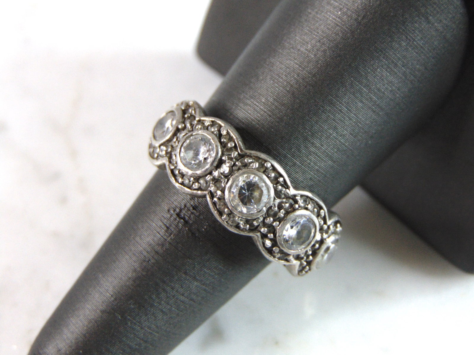Womens Vintage Estate Sterling Silver Modernist CZ Ring: FOR SALE IS A LOVELY VINTAGE ESTATE STERLING SILVER CZ RING. THE RING SIZE IS A 8.0, AND WEIGHS 6.0g. THIS WOULD MAKE A NICE GIFT FOR THAT SOMEONE SPECIAL. ANY QUESTIONS PLEASE DO NOT HESITATE TO ASK.