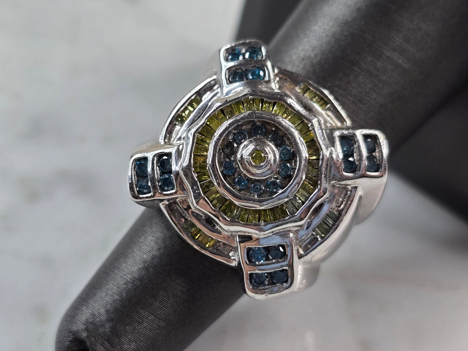 Womens Vintage Art Deco 10K White Gold Topaz & Yellow Diamond Ring: A WOMENS VINTAGE ESTATE ART DECO STYLE 10K WHITE GOLD RING WITH TOPAZ AND YELLOW DIAMONDS. THE TOTAL WEIGHT IS 13.6g, AND IS A SIZE 6.5. THE WIDTH OF THE RING IS 7/8". RING IS MARKED "10K". NOT SURE I
