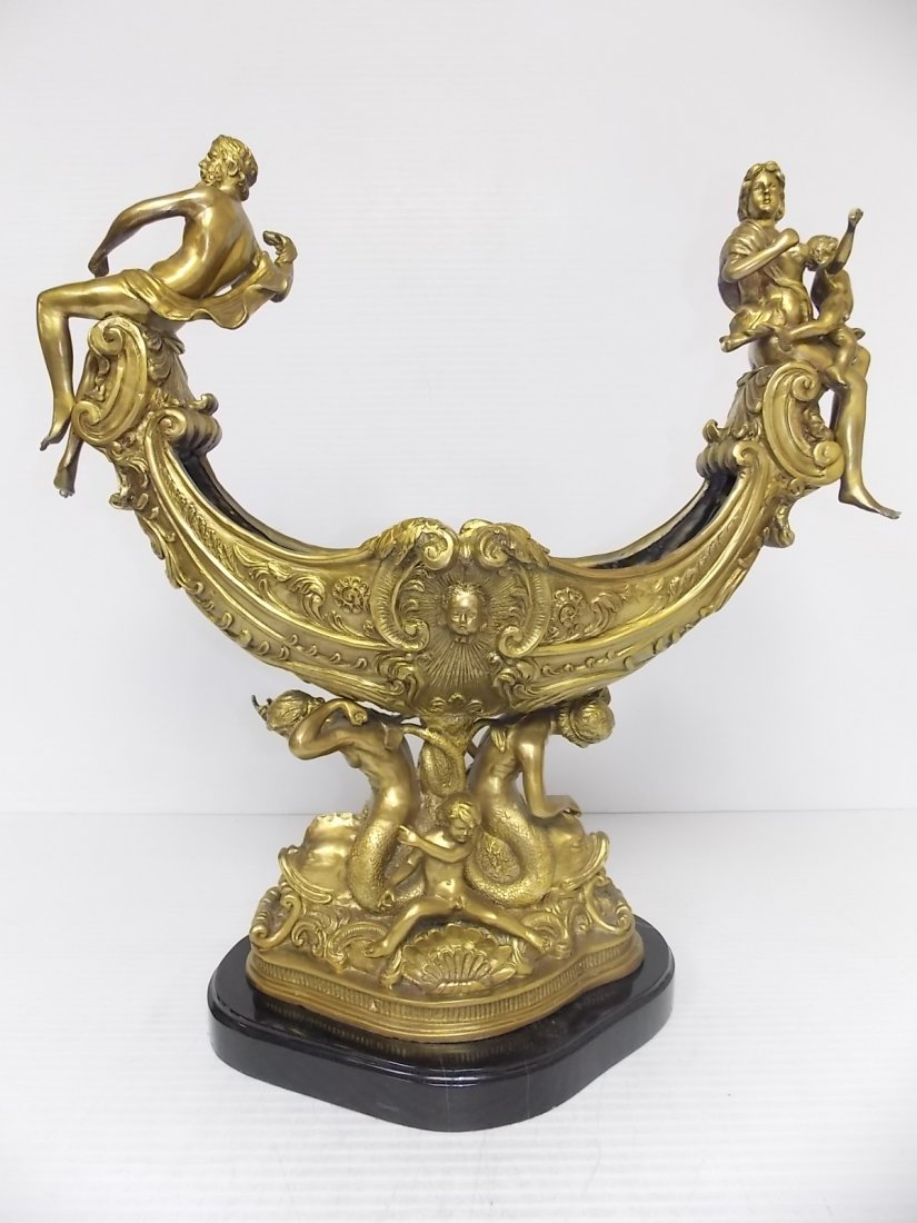 Victorian Style Semi Circle Bronze Urn W/ Mermaids: Up for sale is this nice decorative Victorian style, semi circle bronze statue. The piece measures about 26 1/4" tall by 25 1/2 long by about 14" wide. Makes a great statement piece. SHIPPING IS $120 