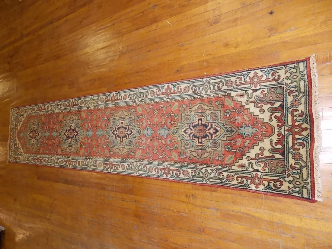 Handmade Indo Serapi Rug Runner 2 X 12: Up for sale is this nice decorative handmade Indo Serapi rug, made in India. Rug measures about 2.7' by 12' Colors are rust and rust. Rug has a retail value of $1750. Comes with a certified appraisal 