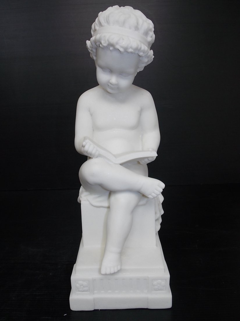 VICTORIAN STATUE OF BOY READING BOOK W/ MARBLE FINISH: AN AMAZINGLY DECORATIVE AND HIGH QUALITY VICTORIAN STYLE STATUE OF A BOY READING A BOOK. THE STATUE STANDS 15" TALL BY 5 1/2" WIDE. STATUE IS MADE OF RESIN WITH A MARBLE FINISH. GREAT PIECE TO ADD TO 