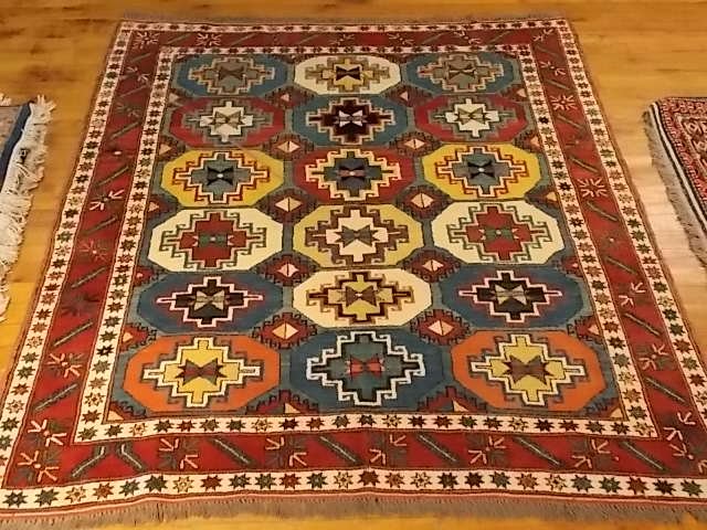 UNIQUE PERSIAN KAZAK TRIBAL DESIGN RUG 5.1 X 5.1: A UNIQUE PERSIAN STYLE KAZAK RUG THAT MEASURES 5.1 X 5.1 . RUG IS ALL HAND DONE, HAND KNOTTED, MADE FROM 100% WOOL ON A COTTON PILE WITH ALL NATURAL VEGETABLE DYES, AND IS IN EXCELLENT CONDITION. RUG