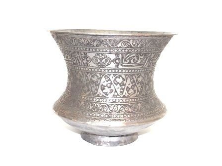 ANTIQUE ISLAMIC PERSIAN HAND HAMMERED COPPER POT: Islamic/Persian antique copper pot with lead overlay was hand hammered, including its design. The design wraps around the pot in an intricate and continuous pattern. This pot measures approximately 6