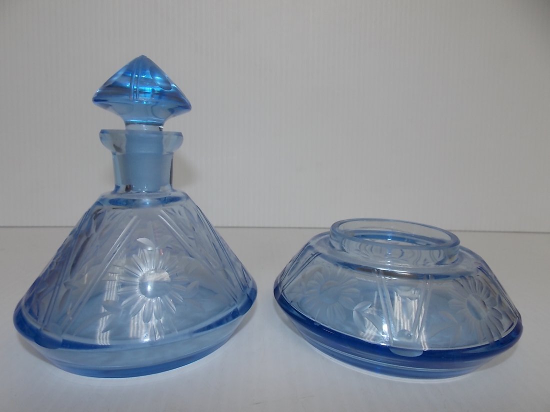 ANTIQUE BLUE ETCHED GLASS PERFUME BOTTLE & VANITY JAR: A DECORATIVE BLUE ETCHED GLASS PERFUME BOTTLE AND VANITY JAR. THE PERFUME BOTTLE MEASURES 5" TALL BY 4 1/2" WIDE. THE VANITY JAR MEASURES 2" TALL BY 4 1/2" WIDE. BOTH PIECES ARE IN GREAT SHAPE JUST TH