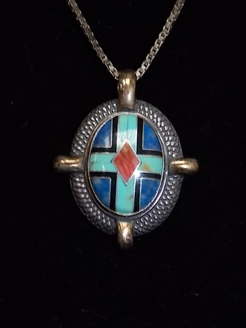 STERLING NATIVE AMERICAN TURQUOISE NECKLACE 13.67g: THIS BLUE & TURQUOISE ANTIQUE NECKLACE HAS BEAUTIFUL MULTI COLOR IN THE PENDENT. THE CHAIN IS 20 INCHES LONG AND TOGETHER THEY WEIGH 13.67g. SHIPPING AND HANDLING IS $4 WITHIN THE CONTINENTAL U.S., AL