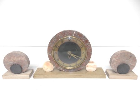 VINTAGE ANTIQUE ART DECO MARBLE CLOCK SET: VINTAGE ANTIQUE ART DECO MARBLE CLOCK SET. THE CLOCK MEASURES 8 3/4" TALL BY 13 1/2" LONG BY 2 3/4" WIDE. THE LITTLE BOOKENDS MEASURE 5" BY 5" BY 2 1/4". NOT SURE WHO THE MAKER IS. DOES HAVE FLAWS AND