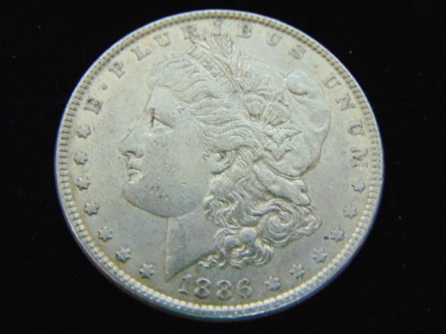 1886 MORGAN SILVER DOLLAR COIN ESTATE FIND (1 of 2)
