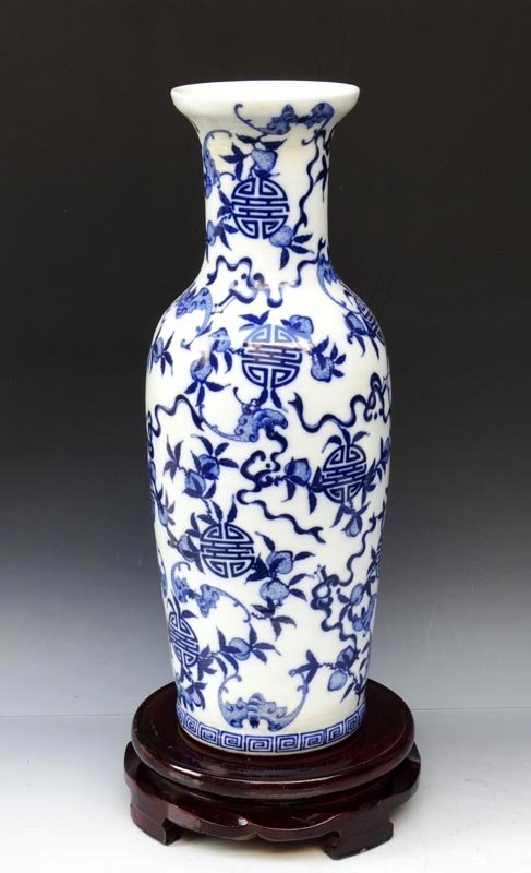 A Fine Chinese Qing Blue and White Porcelain Vase: A Fine Chinese Qing Dynasty Blue and White Porcelain Vase with a Kangxi Mark, Decorated with a Painting of Peaches and Bats, Size: 43.5*16cm