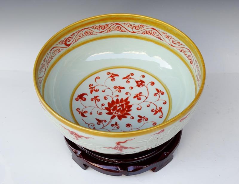 A Large Chinese Ming Gilted and Carved Porcelain Bowl: A Large Fine Chinese Ming Dynasty Gilted and Carved Alum Red Porcelain Bowl with a Xunde Mark, Decorated with Carved Dragons and a Painting of Lotus, Size: H*D 11*26cm