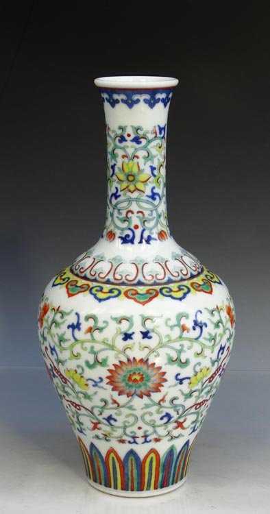 A Chinese Qing B/W and Dou Cai Porcelain Vase: A Chinese Qing Blue White and Dou Cai Porcelain Vase with Qianlong Mark, Size: H*D 22.5*10.5cm