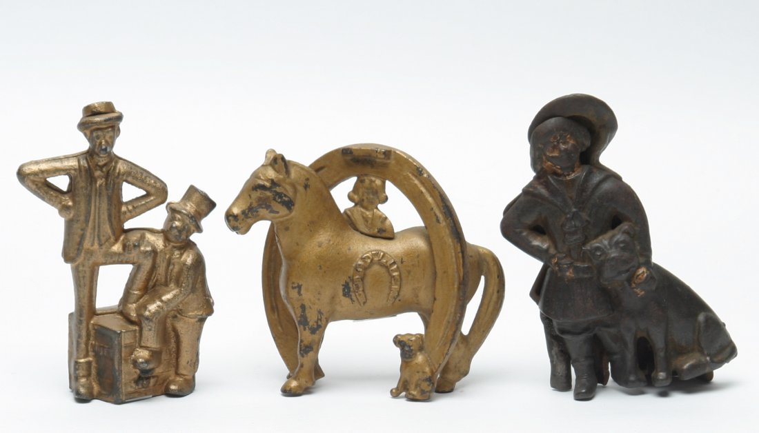 Advertising Character Penny Banks: Lot of Three. Buster Brown with Tige, Buster Brown Good Luck. Mutt & Jeff. Wear to paint, imperfections