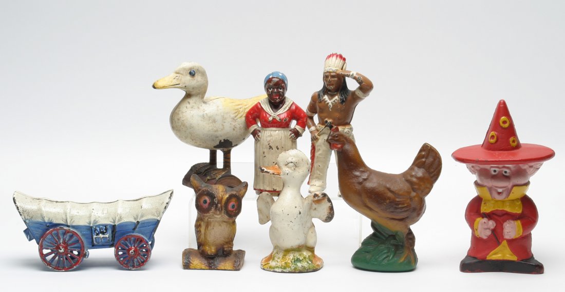 Novelty Penny Banks, Lot of Eight: Includes Conestoga Wagon, Wizard, Mammy, etc. Wear to Paint,.