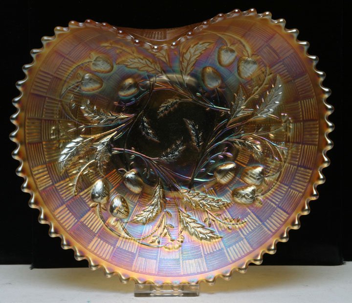 Northwood Wild Strawberry Hand Grip Plate: Northwood Carnival Glass Wild Strawberry Marigold Hand Grip Plate with basketweave exterior pattern and iridescence. Northwood Glass Co. 7 5/8" D, 2 1/4" HOA. Carolyn Price Collection, Bridgewater, Vi