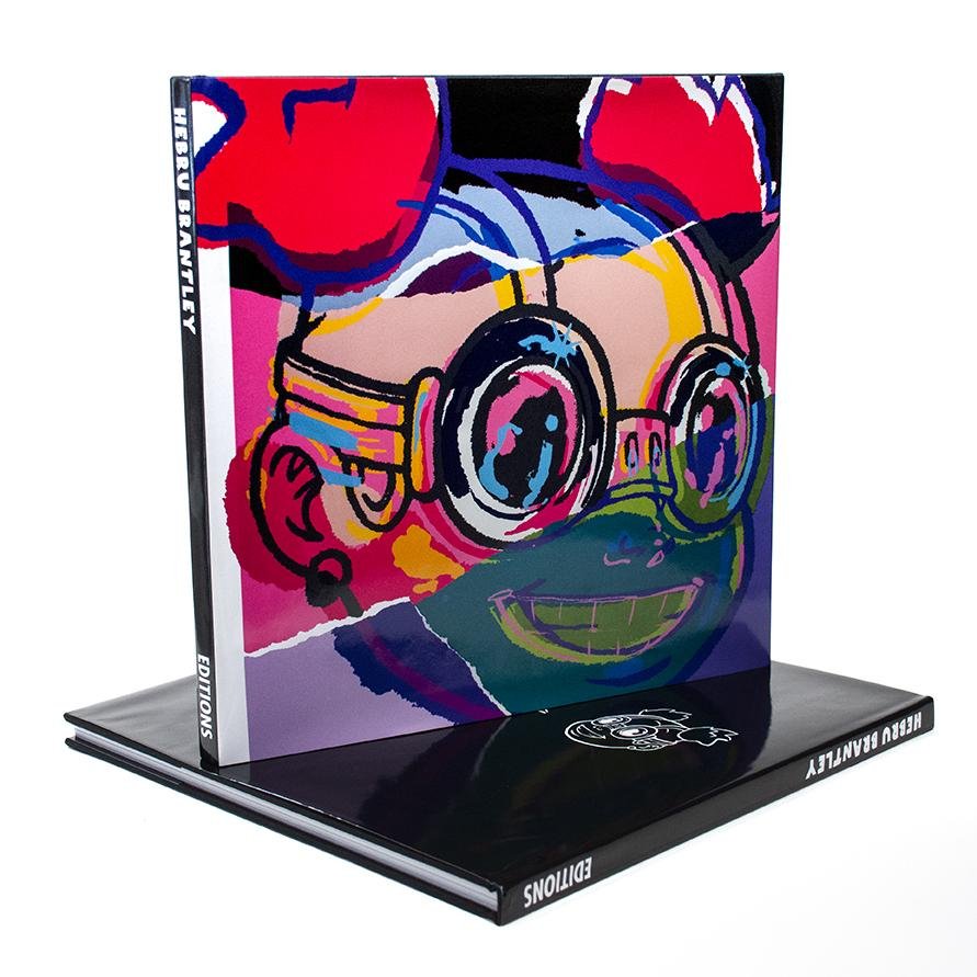 HEBRU BRANTLEY - EDITIONS - LIMITED EDITION BOOK: Hebru Brantley Editions, 2021 160 page hard cover book. 12 3/4 x 12 3/4 x 5/8 in. Edition of 2500.