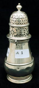 Castor Shaker: Hallmarked Sterling Silver Pierced Castor Shaker, London 1902. Some small dents. Approx 277 grams. Height 19cm, width 9cm.