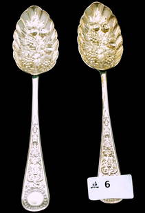 Pair Berry Spoons: Pair Hallmarked Sterling Silver Heavily Embossed Berry Spoons, Sheffield 1903, by Walker & Hall. Approx Total Weight 145 grams, length 22cm.