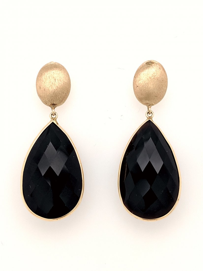 Black Onyx & Gold Earrings: Crafted in 14k Yellow gold with 2 pear shaped multi faceted black onyx. Size: 1.5" from top to bottom and .75" at its widest. Weight: 4.9 grams