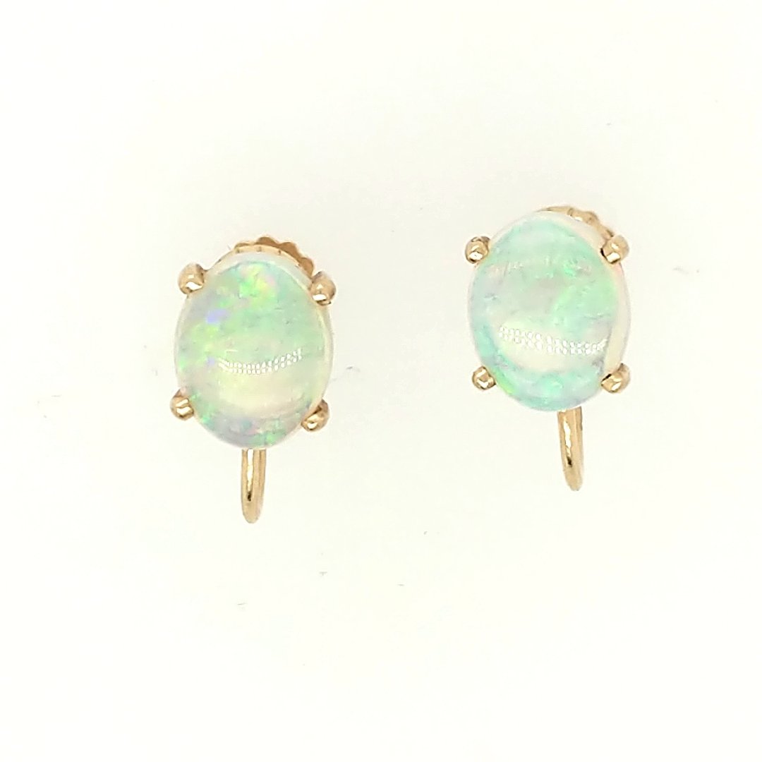 A pair of Opal Earrings: Crafted in 14k yellow gold featuring (2) oval opals measuring approximately 10mm x8mm x 2.5mm Size: 3/4" from top to bottom Weight: 2.5dwt