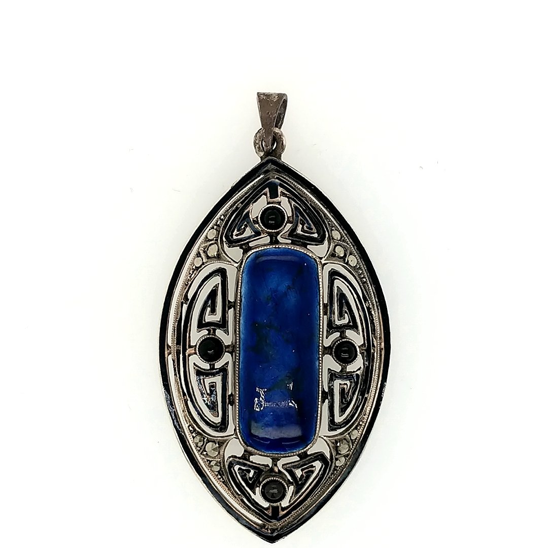 A Lapis Pendant: Crafted in sterling silver with lapis and black onyx Size: 2 1/4" x 1 1/4" Weight: 7.7dwt