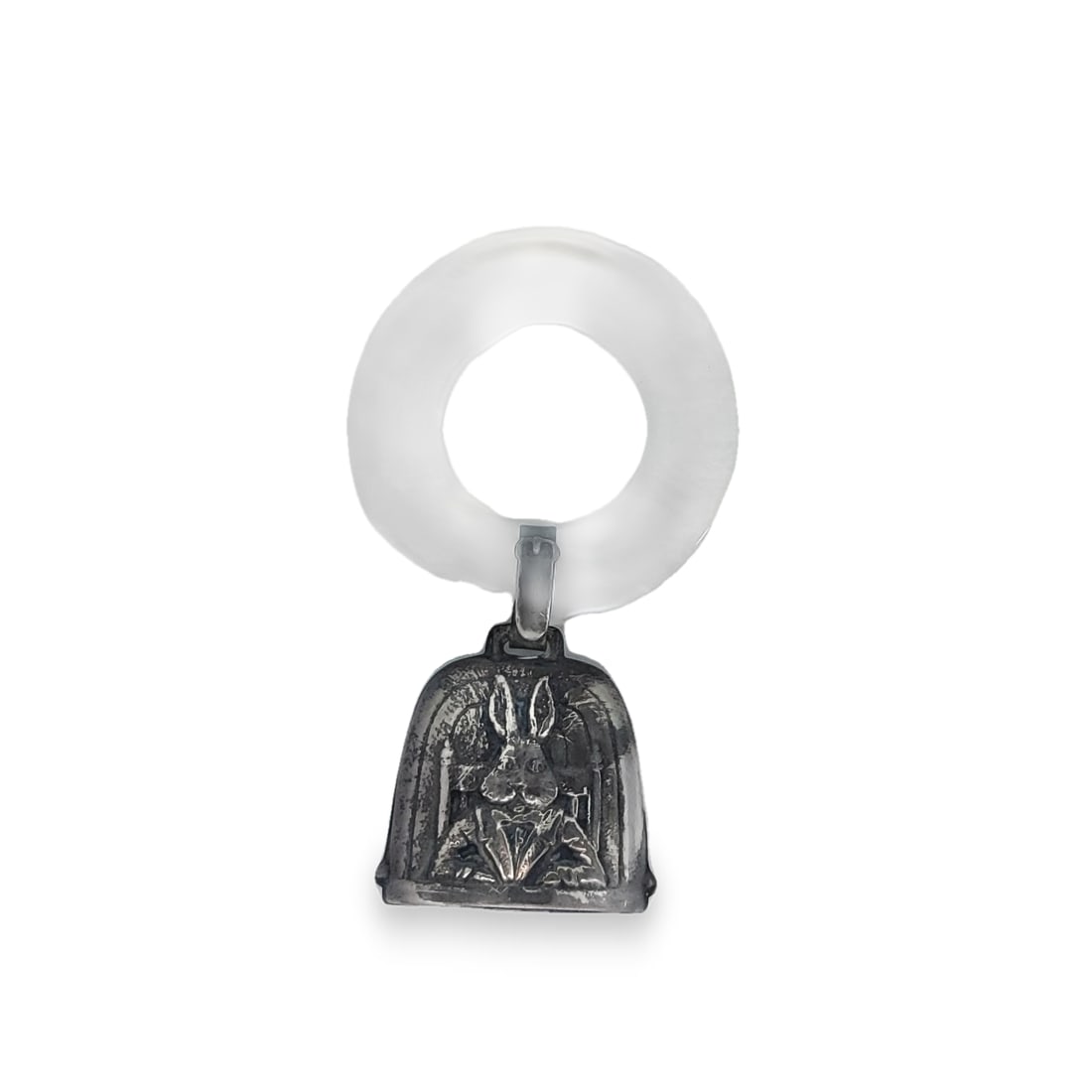 Vintage Sterling Silver Baby Rattle: Crafted in sterling silver the rattle depicts a rabbit sitting in a chair. The rattle is stamped SR Sterling and it measures 3in x 1 3/4in and weighs 7.5 dwt.