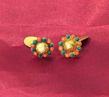 Coral and Malachite Cuff Links: Crafted in 14k yellow gold the cuff links feature coral and malachite beads surrounding a gold dome. Cuff link tops measure 1/2in x 1/2in and weigh 6.6dwt