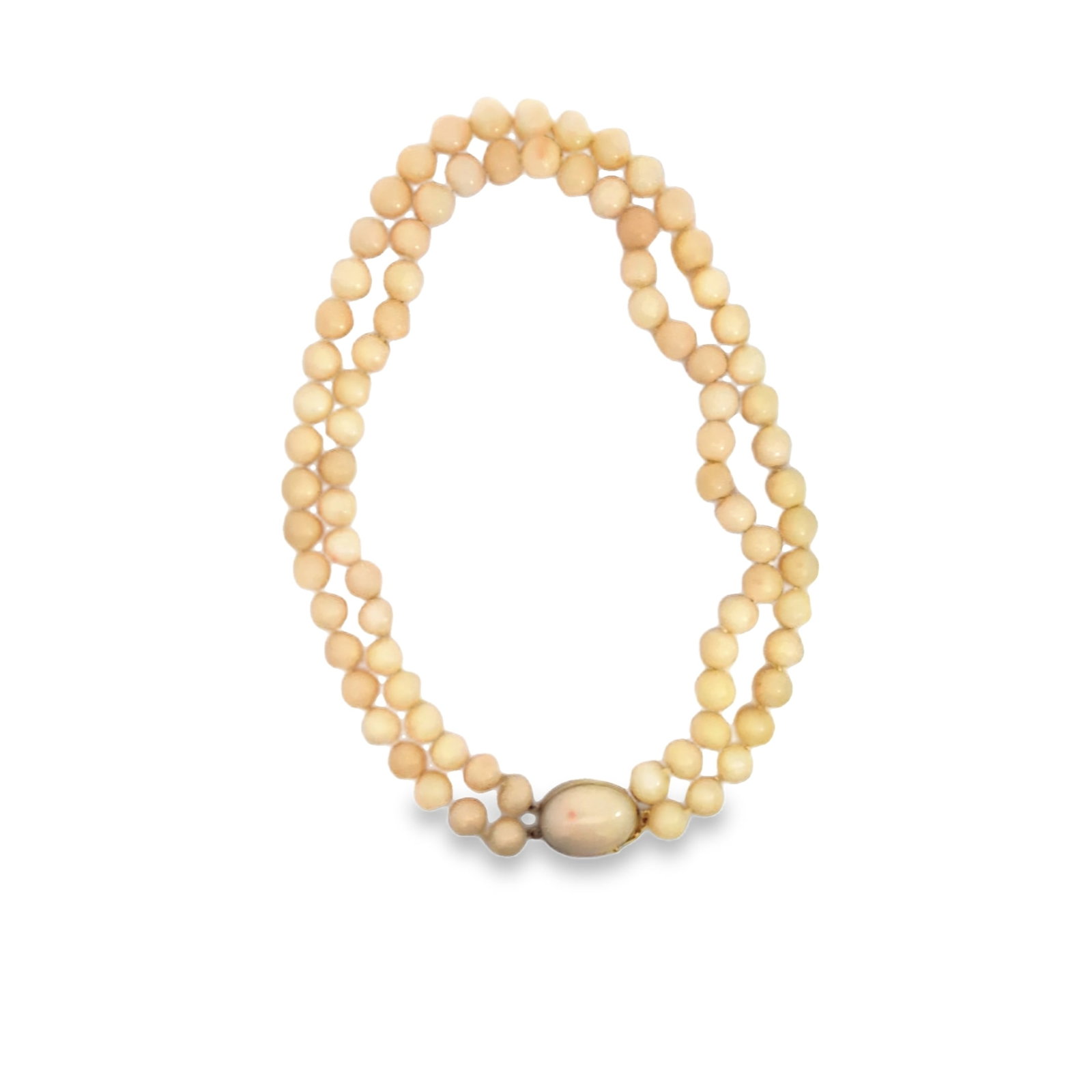 Coral Necklace and Bracelet Set: The bracelet is crafted in 18k yellow gold featuring an oval coral clasp and (32) round coral beads measuring 8mm. The bracelet measures 6 1/2in in length and weighs 23.4dwt. The necklace is a coral c