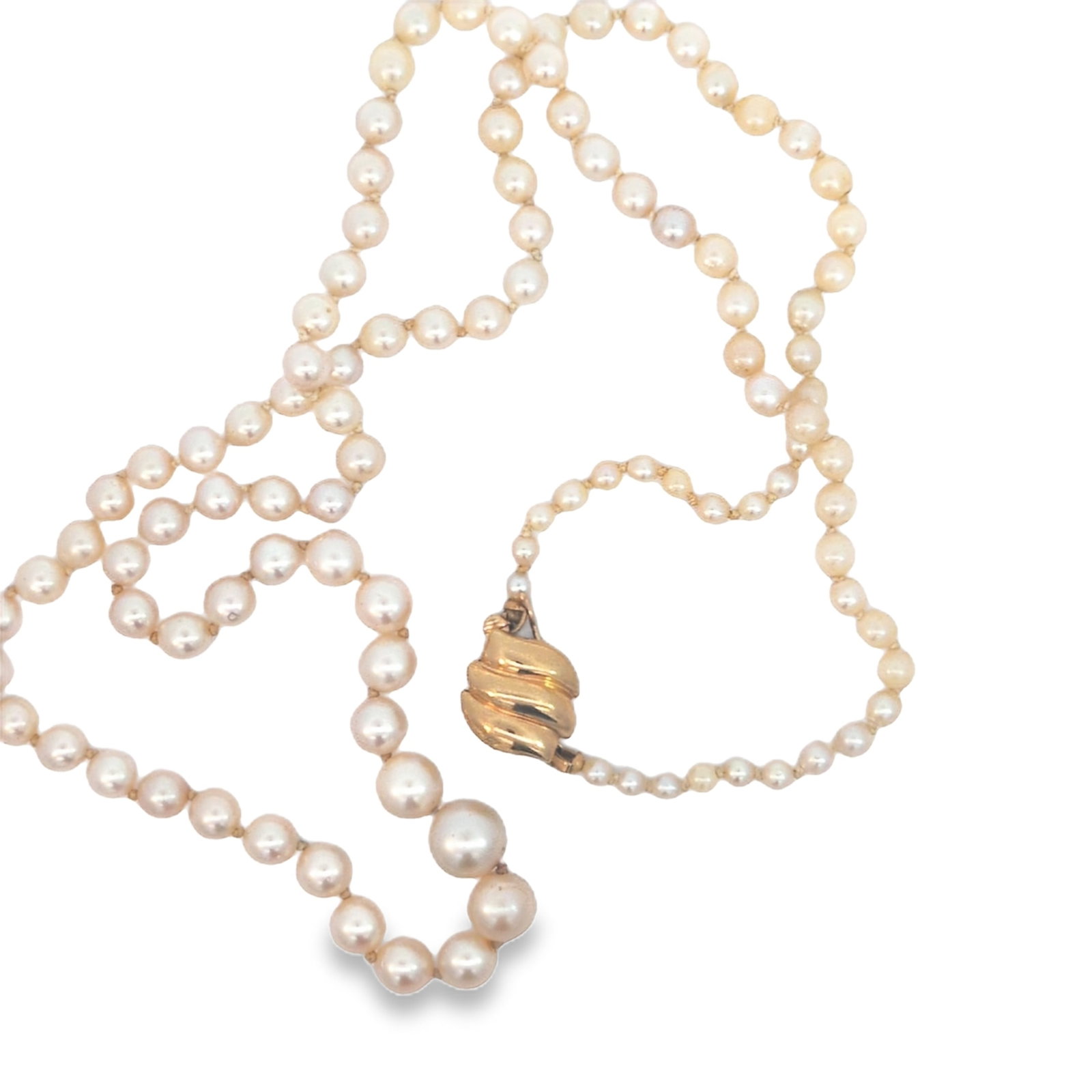 Graduated Pearl Necklace: Pearls come with a 14k yellow gold clasp. The largest pearl is 9mm and the smallest pearl is 3 1/2mm. The necklace measures 25in in length.
