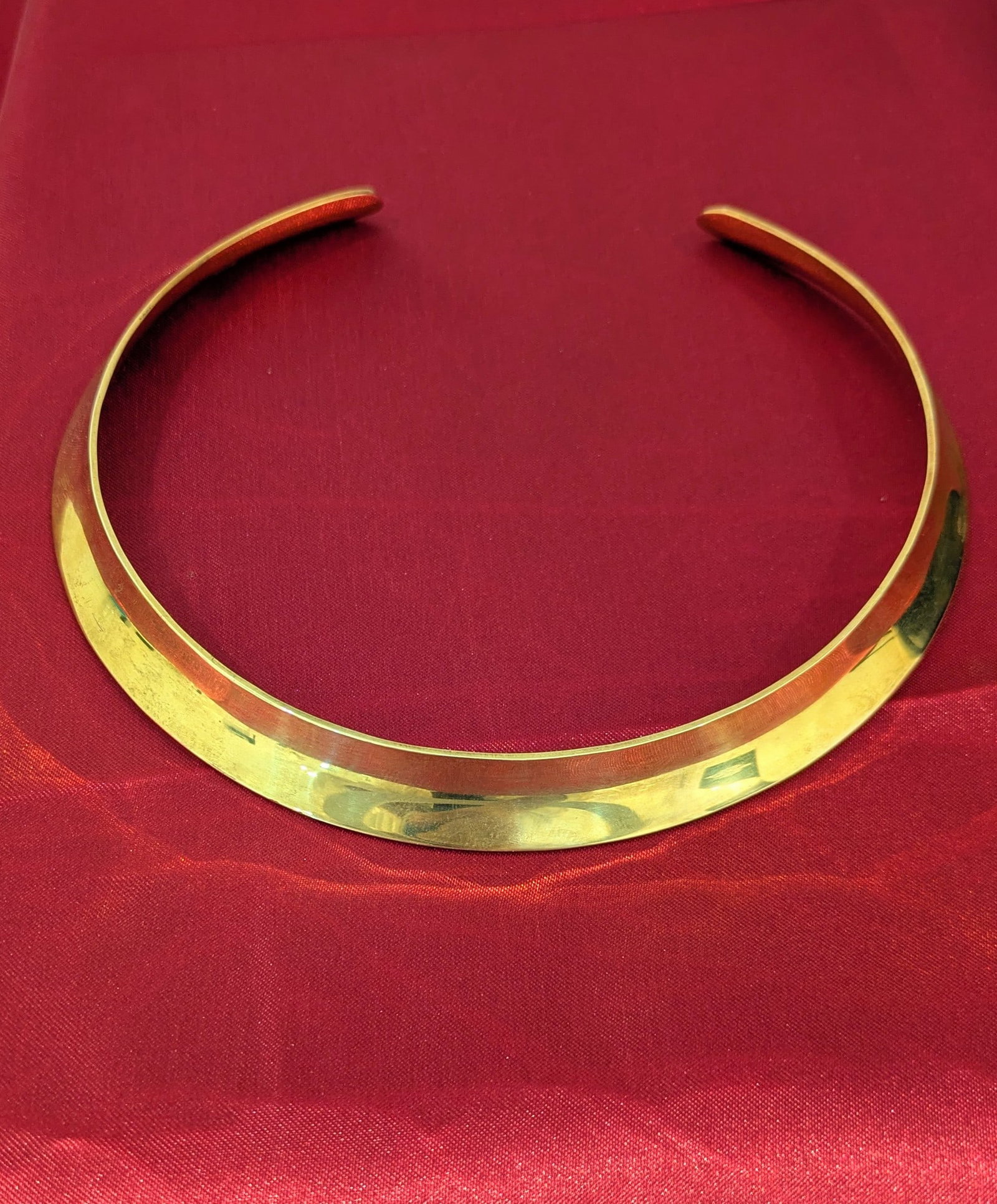 Gold Vermeil over Sterling Silver Necklace: Crafted in sterling silver with a gold vermeil, the necklace measures approximately 16 1/2in in length, 1/2in in width and weighs 38.3dwt