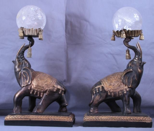 2 Carved Wood Elephants with Crystal Balls: 2 Chinese carved wood elephants with crystal balls. 17" high.