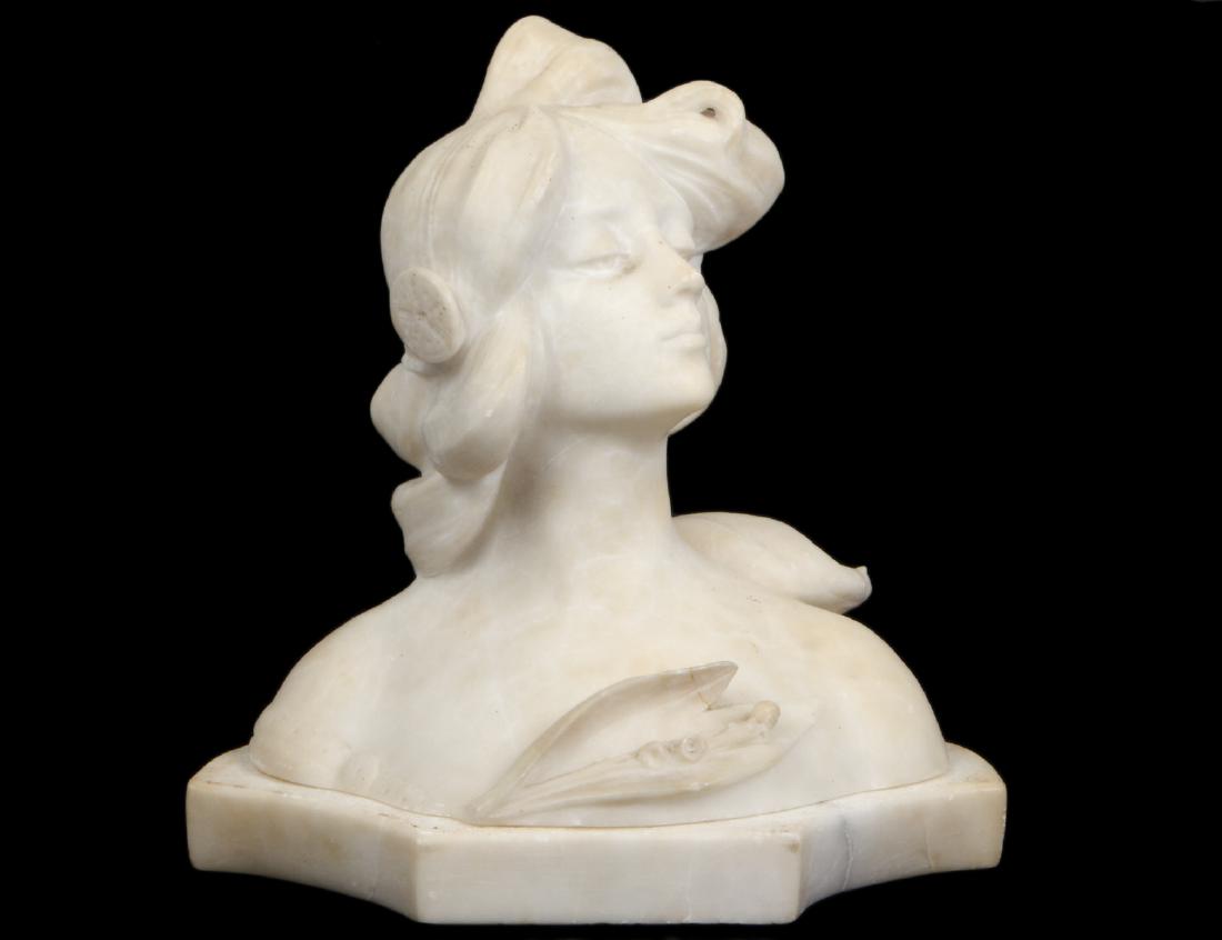ITALIAN ALABASTER BUST OF A MAIDEN: Circa 1900. Scantily clad, gazing left, atop a shaped base. Height overall 12”. Width 11 ½”. (Cond: good, base separate) (200/300)