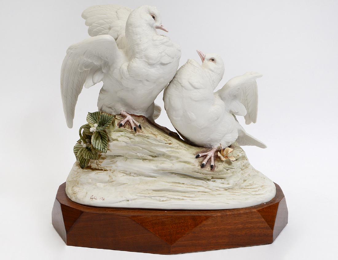 CYBIS PORCELAIN “DOVES OF PEACE” BIRD GROUP: Circa 1970. Signed in script Cybis. Dated ’72. Designed by Marilyn Chorlton for a peace conference with Russia, the birds atop a rock mound, on a wood base. Height 12”. Width 10”. (Cond: good) (