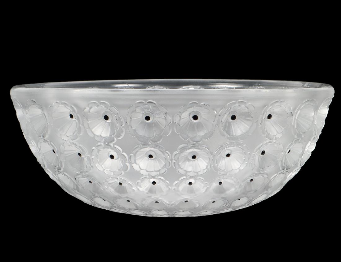 LALIQUE CRYSTAL “NEMOURS” BOWL: French. 20th Century. Signed on base. Frosted glass. Impressed blooms to exterior side of bowl. Diameter 10”. (Cond: good) (400/600)
