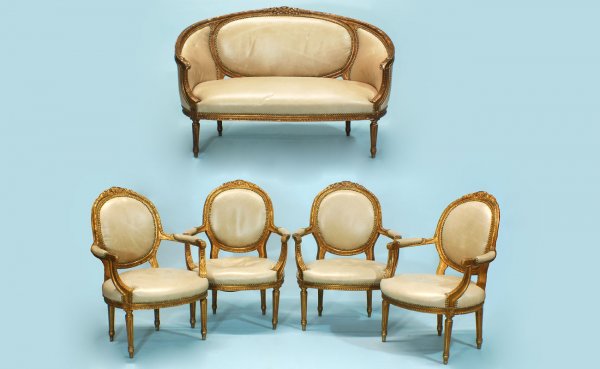 Five Piece Louis XVI Style Salon Suite: Five Piece Louis XVI Style Salon Suite Consisting of a Settee and four arm chairs. Nice leather upholstery (one needs repair seat). Some slight losses to giltwood. Settee 35 inches high by 50 1/2 inch