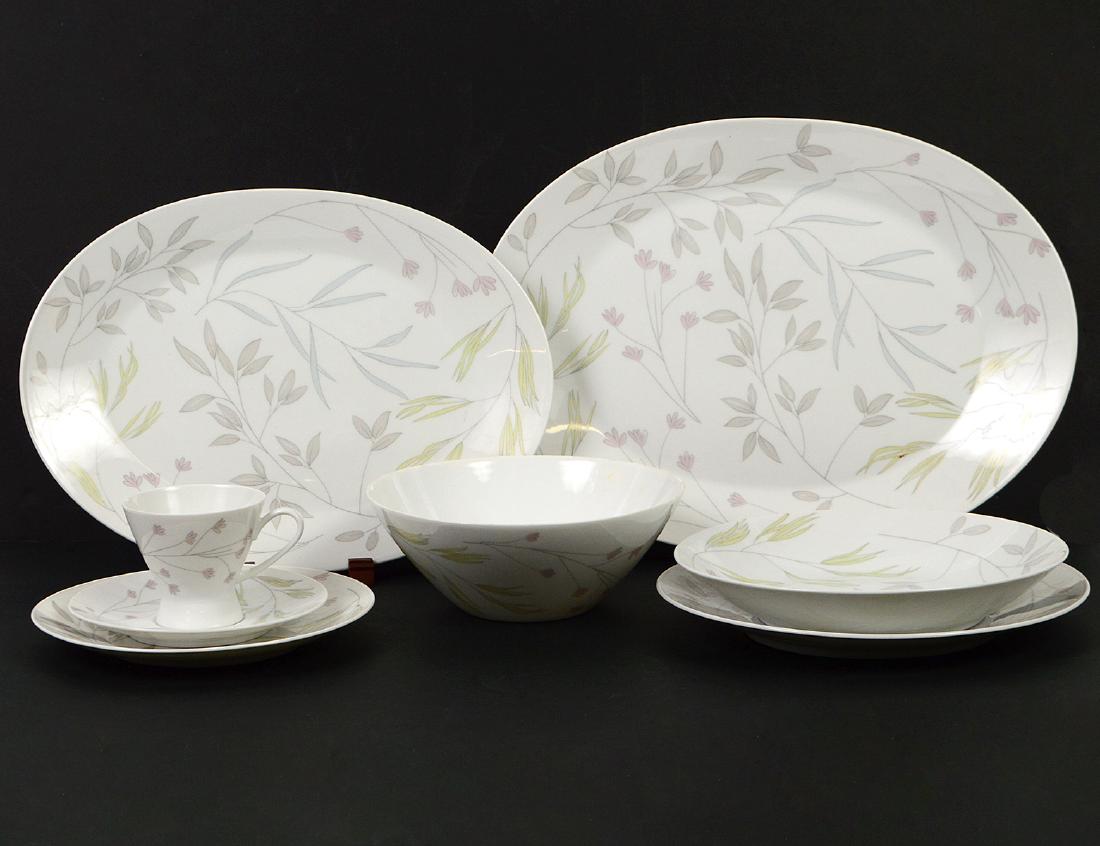 ROSENTHAL 72 PIECE PORCELAIN PART DINER SERVICE: Modern. Marked on the underside. Comprising: 14 dinner plates, 11 luncheon plates, 11 soup bowls, 11 desert bowls, 2 oval platters, 2 bowls, a condiment bowl, a small pitcher, 8 Cups and 11 saucers. E
