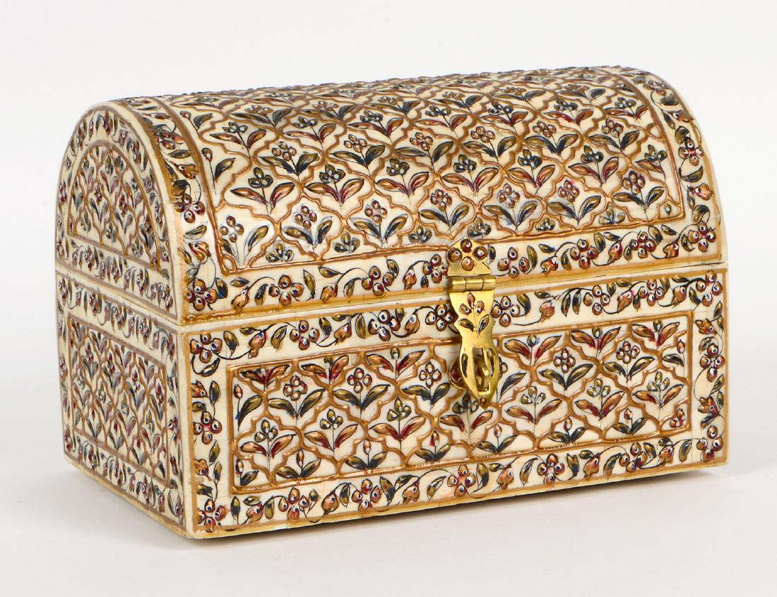 PAINTED BONE VENEERED DOMED JEWELRY CASKET: Modern. Probably Russian. Decorated allover in green and red with stylized foliage. Height 6 1/2". Width 91/4". Depth 6". (Cond: good, lacks key) (300/500)