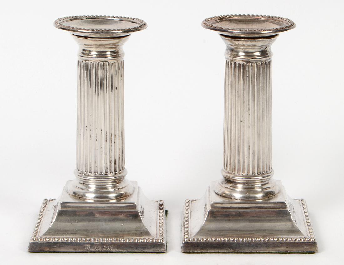 PAIR OF EDWARDIAN REEDED SILVER CANDLESTICKS (1 of 2)