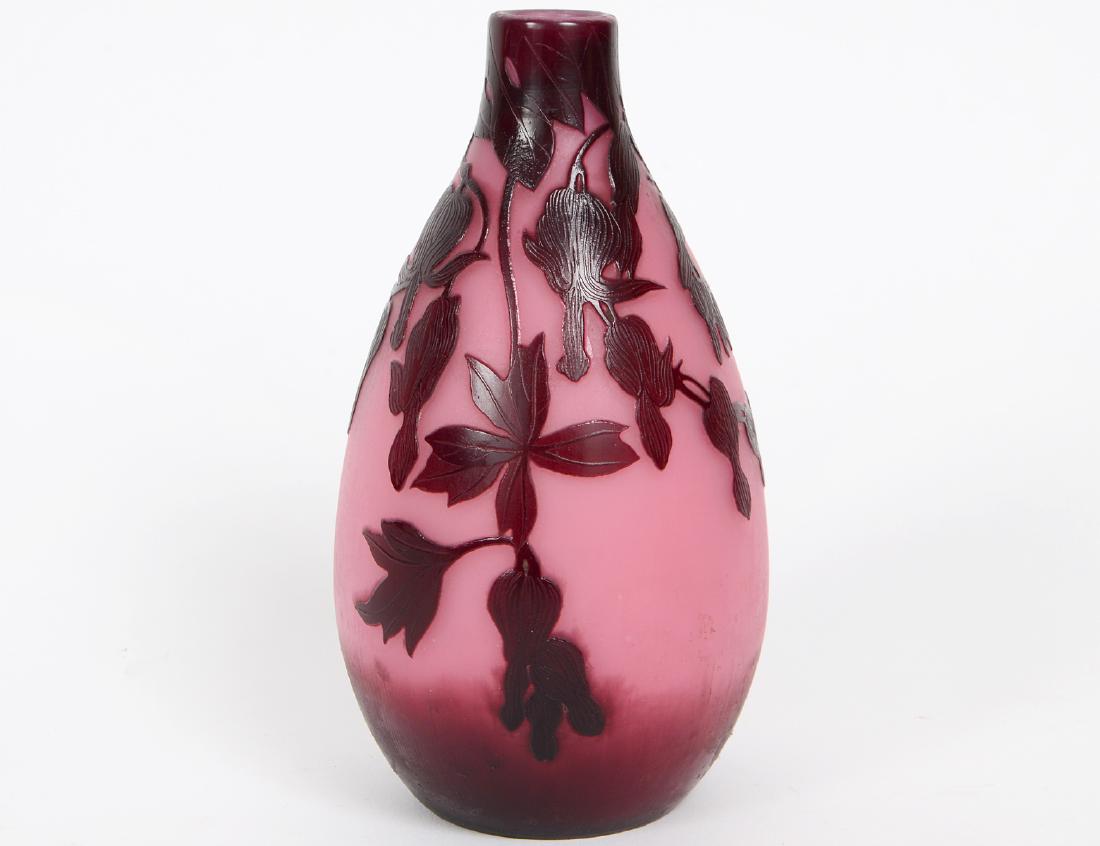 ANDRE DELATTE CAMEO CUT GLASS VASE: Circa 1900. Nancy, France. Signed. The violet teardrop form vessel cut with foliage on a light violet opaline ground. Height 6 3/4". (Cond: possibly reduced, minor scratches)