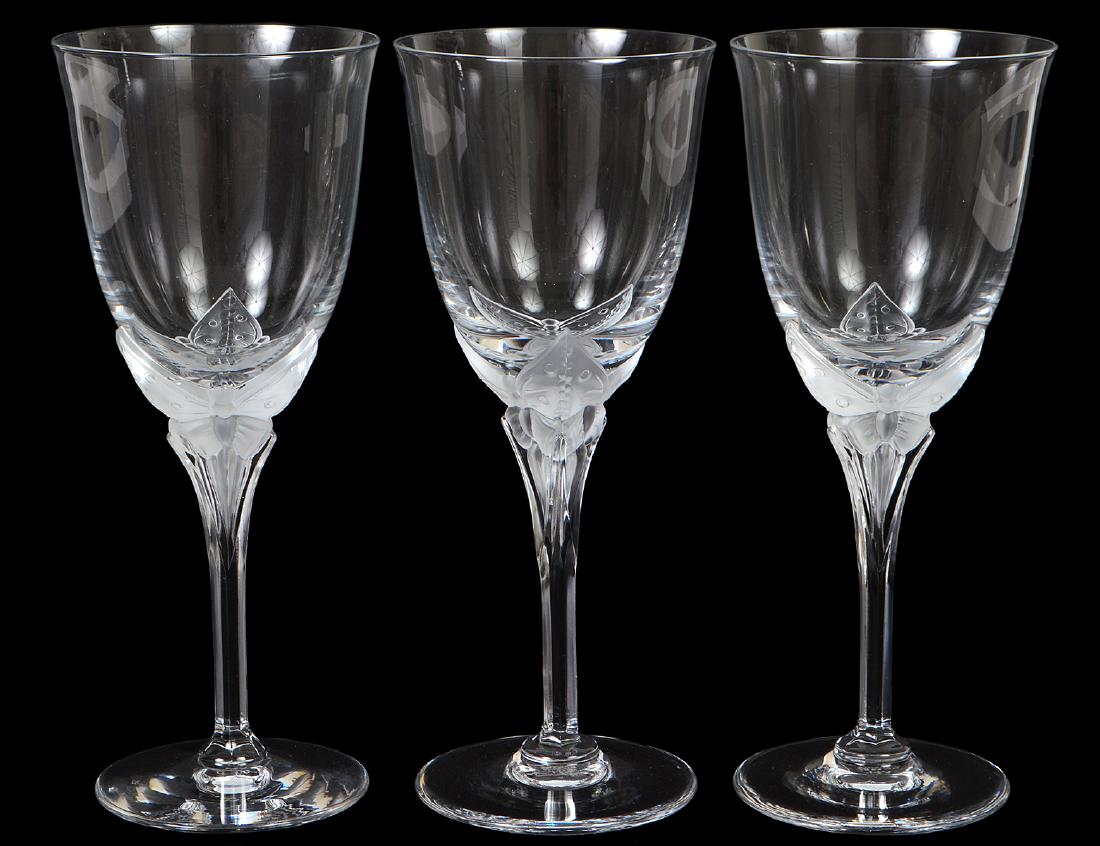 SET OF TWELVE COLORLESS GLASS RED WINES: Each bell-shaped bowl atop a stem with a molded frosted glass butterfly, on a circular foot. Height 8". (Cond: good)