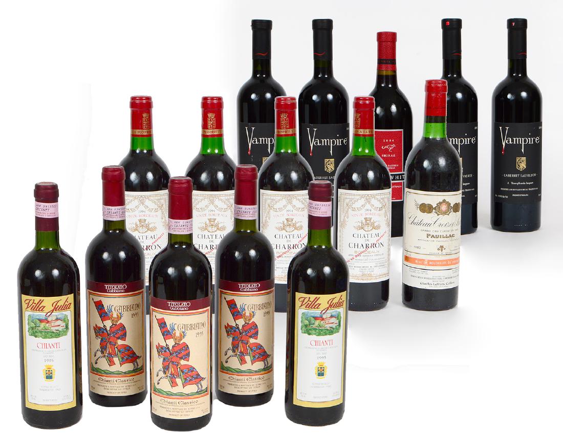 SIXTEEN VARIED BOTTLES OF RED WINE: Including: four bottles of Transylvania, 2000 Vampire, three bottles of Gabbiano 1995 Chianti Classico, a Chateau Corivet Bages,1982 Pauillac and four bottles 1994 Chateau Du Charron Bordeaux.