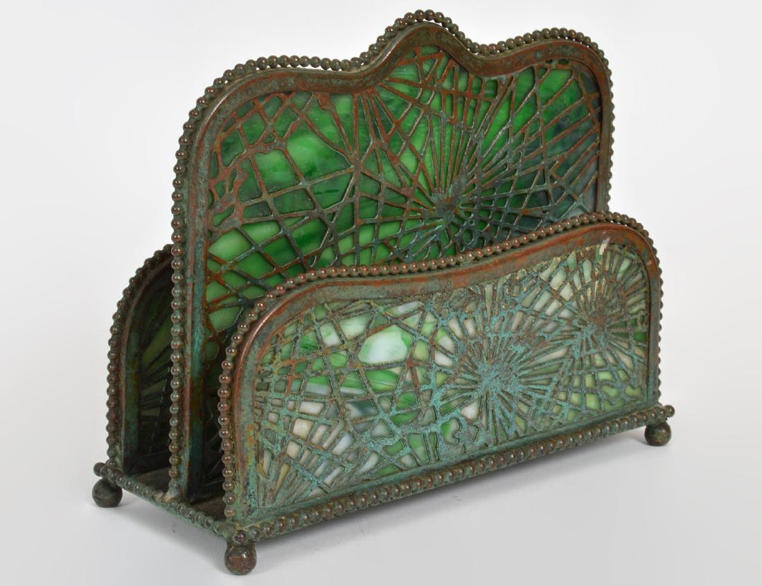 TIFFANY STUDIOS BRONZE & GREEN GLASS LETTER HOLDER: Circa 1900. Signed Tiffany Studios, New York. Green slag glass, with bead borders and ball feet. Height 5 1/4". Width 6 1/2". (Cond: good)