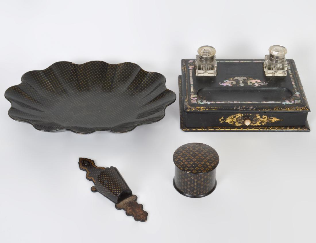 GRP OF VICTORIAN BLACK LACQUER PAPIER-MACHE ITEMS: Mid to Late 19th Century. Comprising an ink standish, with two glass bottles, a lobed gilt on black lacquer bowl, a circular covered box and a pipe holder. Width of bowl 13”. Width of standish 1