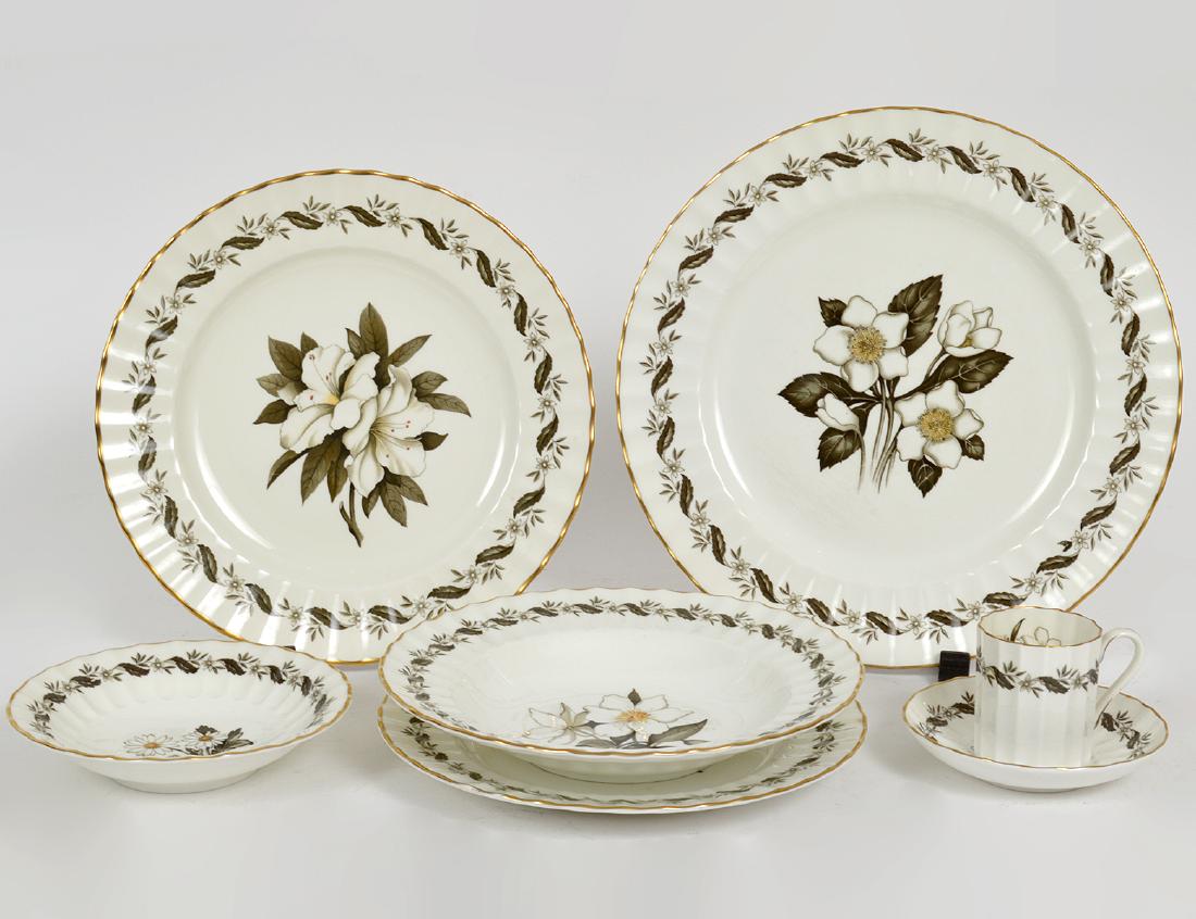ROYAL WORCESTER ENGADINE PORCELAIN TABLE SERVICE: English, 20th Century. Marked on the underside. The extensive one hundred eighty-five piece service comprises: 13 dinner plates, 12 luncheon plates, 14 bread plates, 12 soup bowls, 14 desert plates, 1