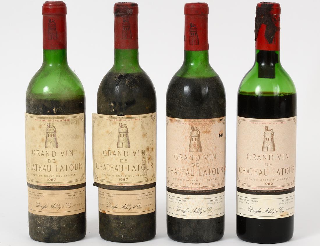 FOUR FRENCH CHATEAU LATOUR RED WINE BOTTLES: Consisting of Two (2) 1967 Bottles and Two (2) 1969 Bottles. Provenance: Estate of Jan West, Palm Beach, Florida.