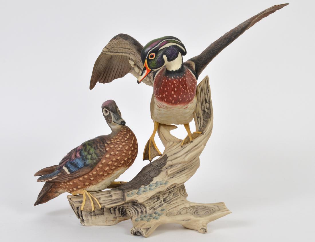 BOEHM PORCELAIN GROUP OF TWO WOOD DUCKS: Limited Edition Edward Marshall Boehm Wood Ducks (Aix Sponsa) 40192, Number 69. Height 15 ¾”. (Cond: on foot of right duck reattached)