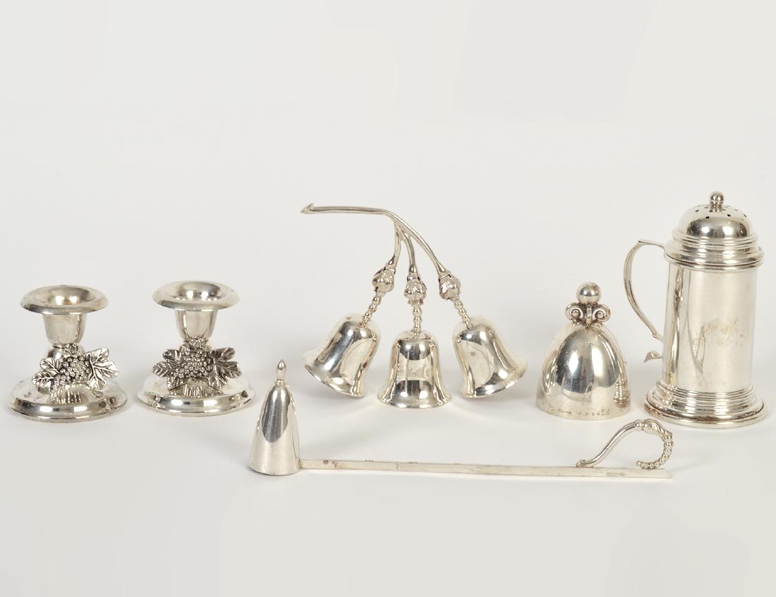 MISC. STERLING SILVER & SILVER PLATE TABLE ITEMS: 20th Century. Four with makers marks. Comprising: a Frank Whiting & Co. sterling sugar caster, an American sterling dinner bell, a Mexican sterling triple-bell dinner bell, a Webster sterling candle s