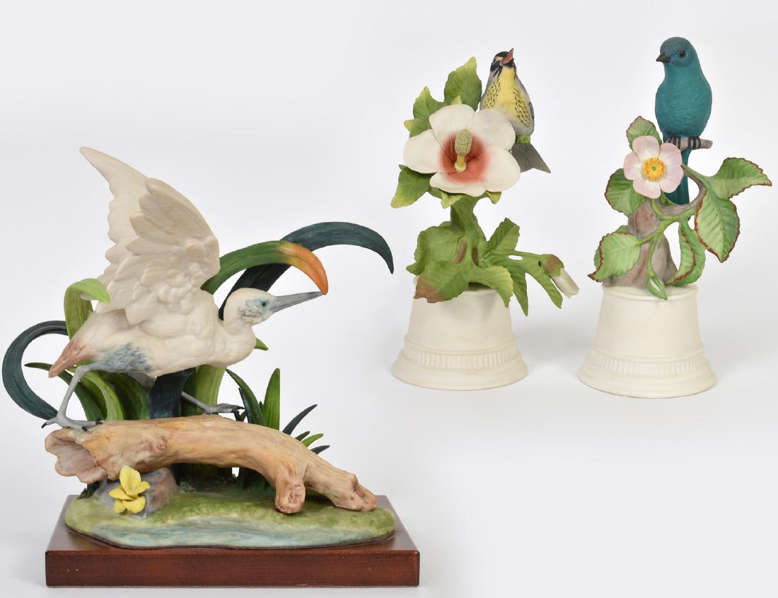 CYBIS PORCELAIN WATER BIRD: Number 312, marked. The white bird foraging amidst tall grass set in a wood base. Height overall 10”. (Cond: good)