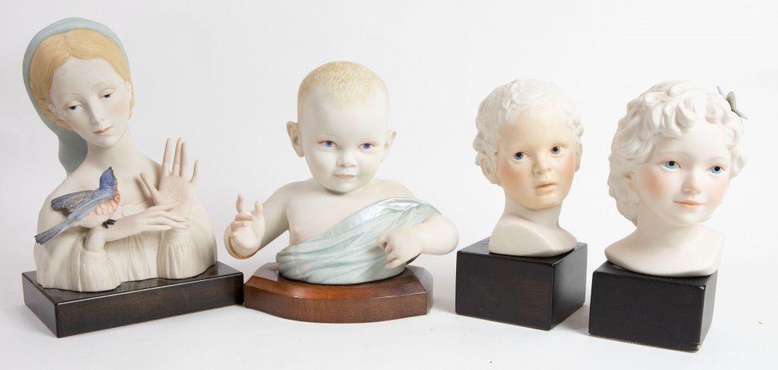 THREE CYBIS PORCELAIN CHILDERN & CYBIS MAIDEN: Signed, some numbered. The maiden with a bird, the baby, a bust with outstretched arms, the children a male and female bust, all on wood bases. Height overall of maiden 12 in., children overall 9 to 1