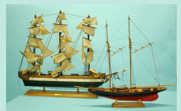 Two Wooden Ship Models: a) Three-Masted Clipper Sh: Two Wooden Ship Models: a) Three-Masted Clipper Ship "Rainbow" at full sail measuring 33 inches long by 25 inches high from base to top of the center mast. Some damage to sails and rigging evident; an