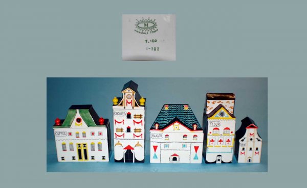 Five-Piece Set of Mancioli Italian Ceramic Kitchen: Five-Piece Set of Mancioli Italian Ceramic Kitchen Canisters, hand-painted and glazed and depicting various sized colorful buildings. A few edge chips evident but overall in good condition. AGOPB Will