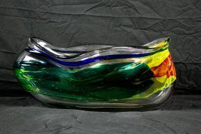 LEON APPLEBAUM (American. b. 1945) STUDIO GLASS: Freeform Lava Bowl. The underside with etched signature. The asymmetrical oval bowl incorporating colors within a colorless ground. Height 9 ½ in. Width 21 in. (Cond: good)